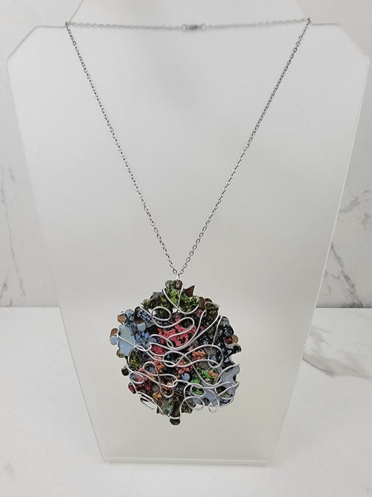 Silver Wrapped Puzzle Piece Pendant